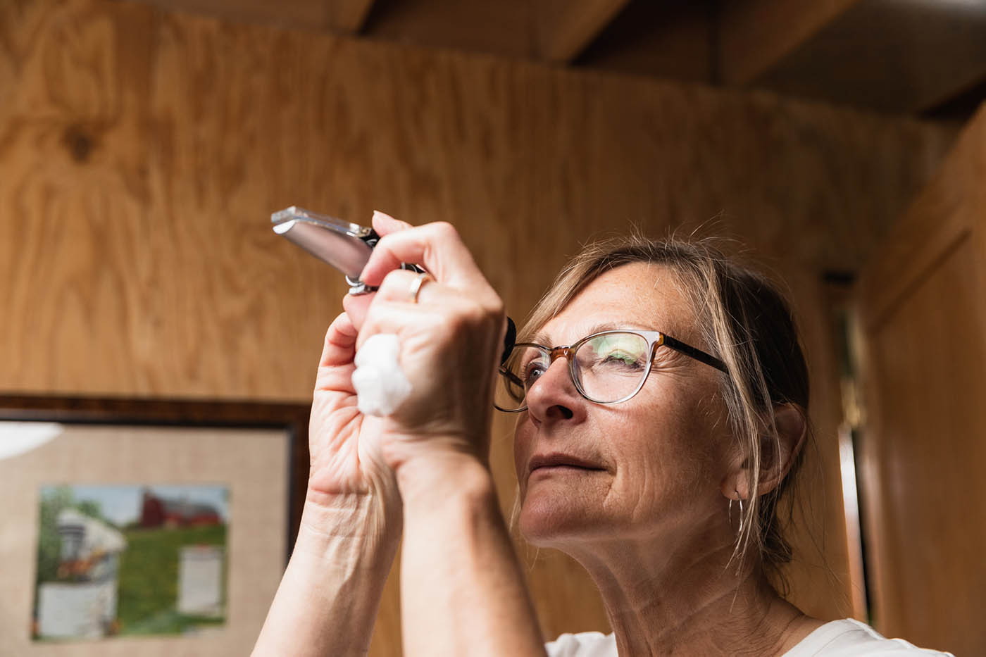 Checking the honey with a refractometer